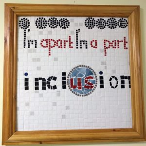 Mosaic saying "I'm apart, I'm a part - inclusion"