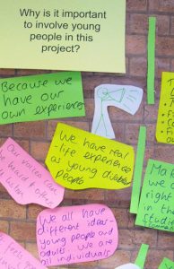 Post it notes with young people's thoughts about why they should be included in a project