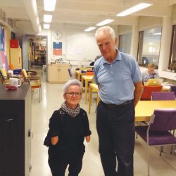 Tara and Martin standing in a classroom