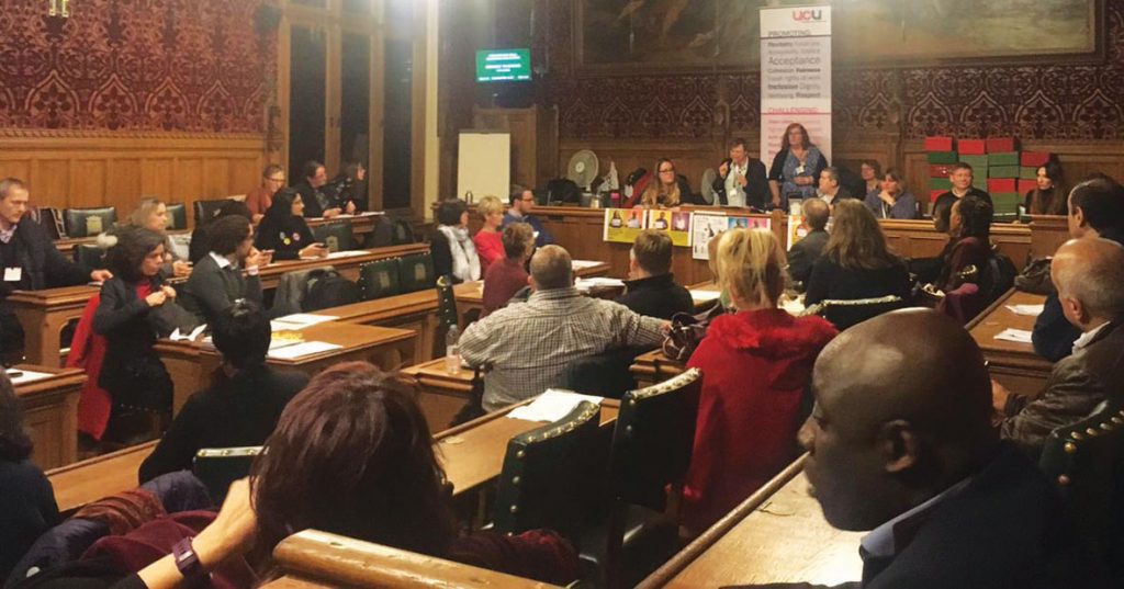 Committee room 10, a wood panelled room, at the House of Commons, full of attendees at the day of action