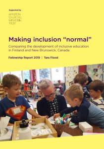 Report cover showing Tara playing with some young children