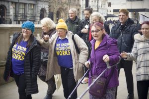 ALLFIE supporters marching down Whitehall