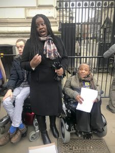 Marsha Cordova giving a speech outside the gates of Downing Street